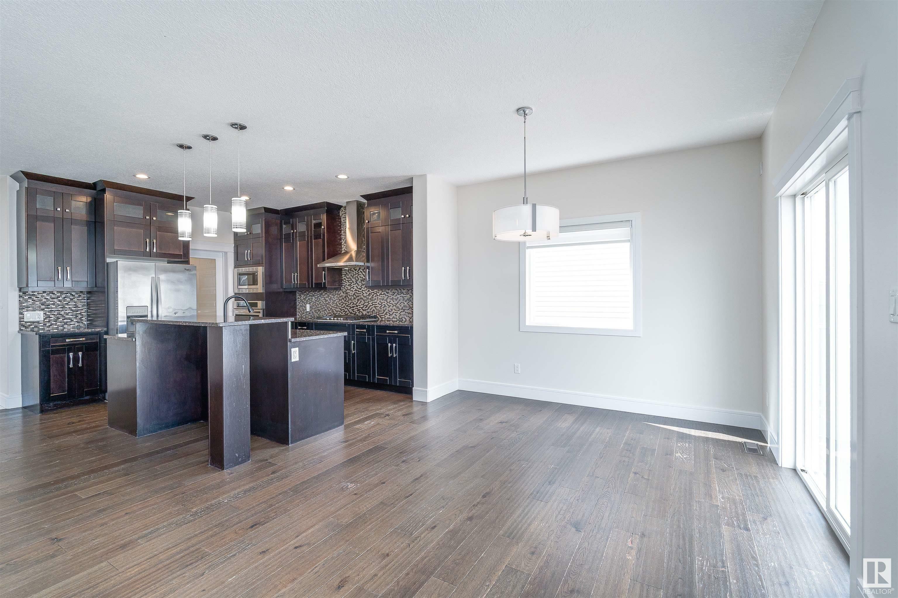 Property Photo: 4228 Charles Close SW AB T6W 0Z5