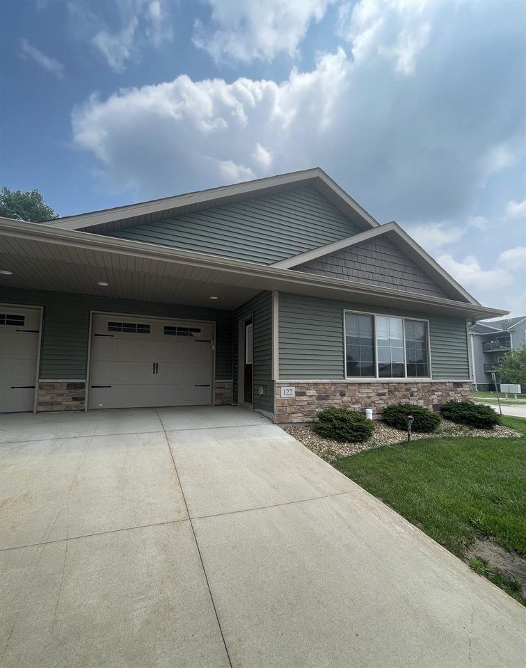 Property Photo:  122 Wild Rose Ln  IA 52333 