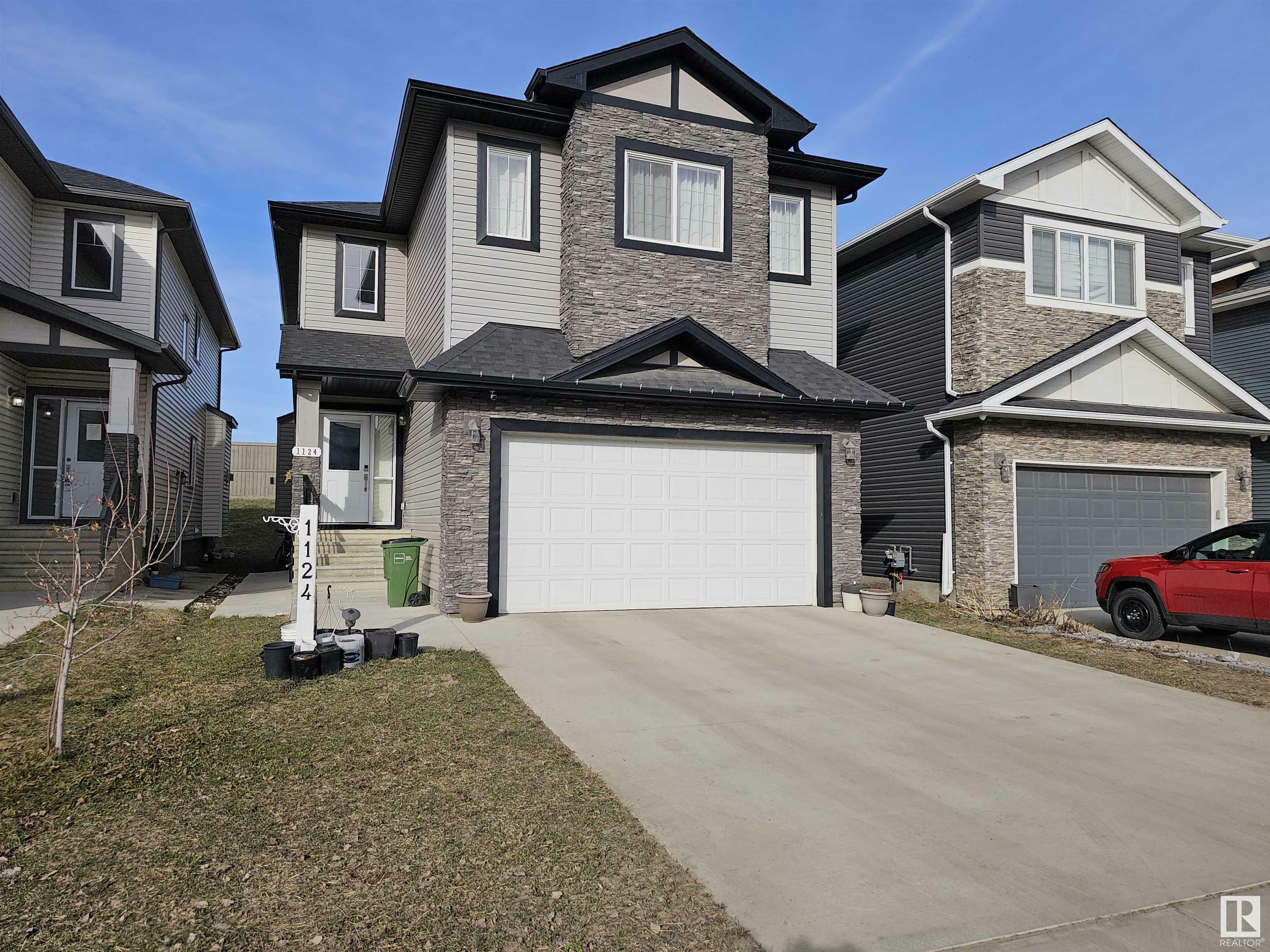 Property Photo: 1124 152 Avenue NW AB T5Y 0Z5
