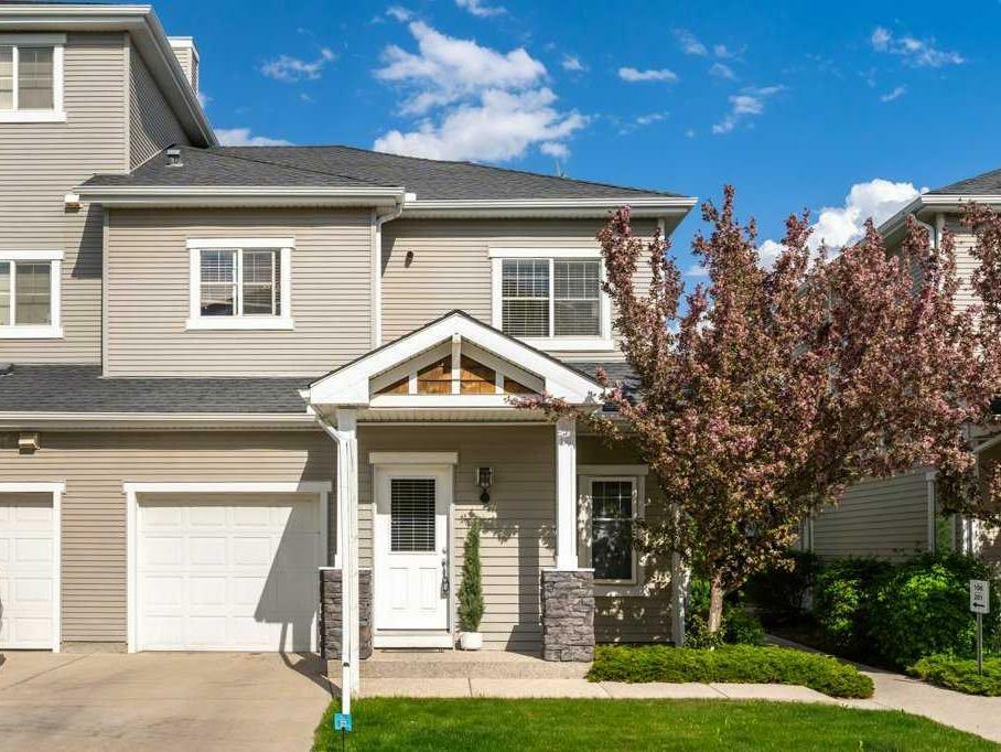 Property Photo:  281 Cougar Ridge Drive SW 105  AB T3H 0J2 
