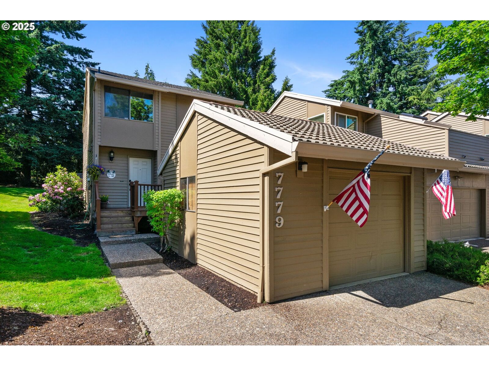 Property Photo:  7779 SW Raintree Dr  OR 97008 