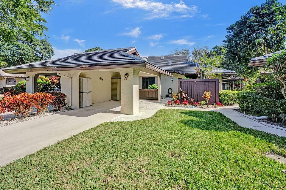 Property Photo: 10112 Marwood Place FL 33437