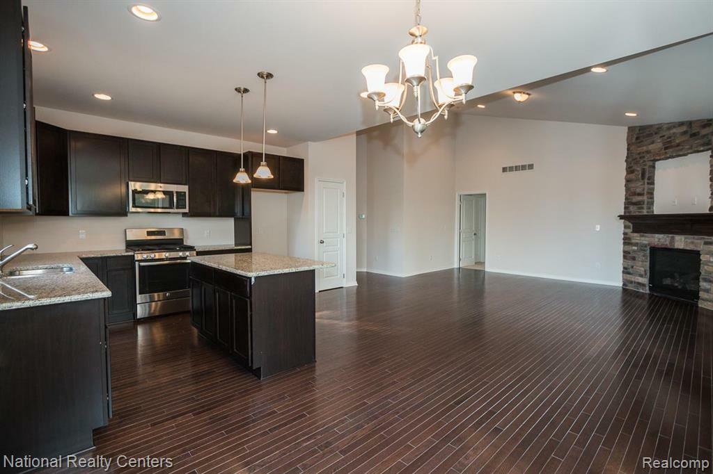 Property Photo: 251 Devonshire Drive 1 MI 48446 4798