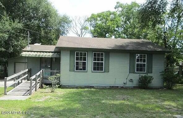 Property Photo: 9115 Tyler Avenue FL 32208