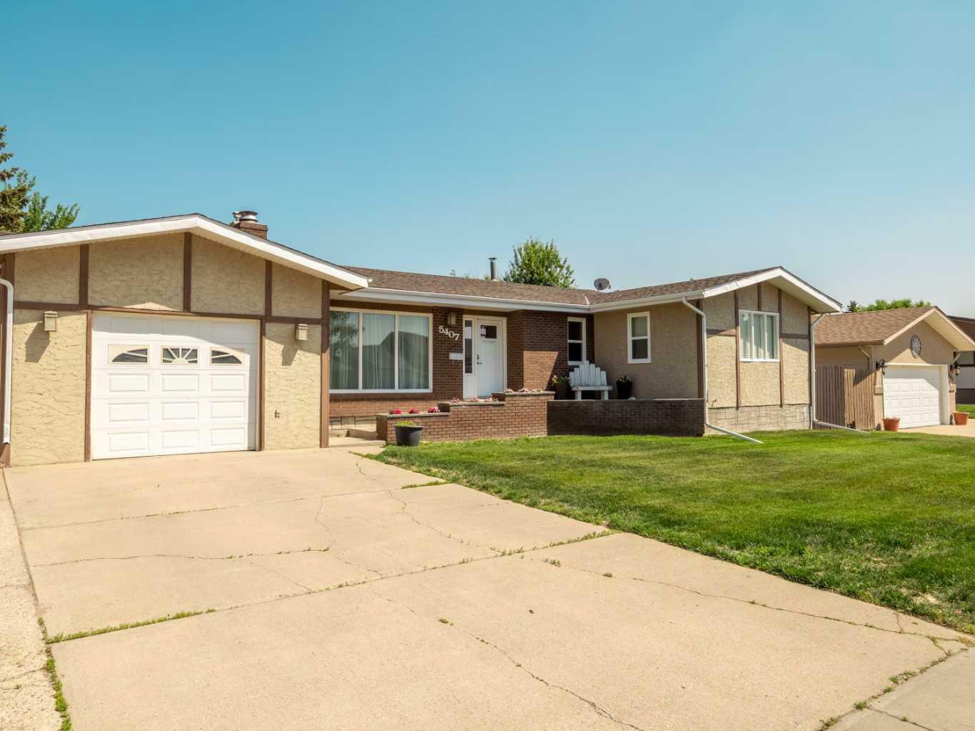 Property Photo: 5407 45 Street AB T1G 1G7