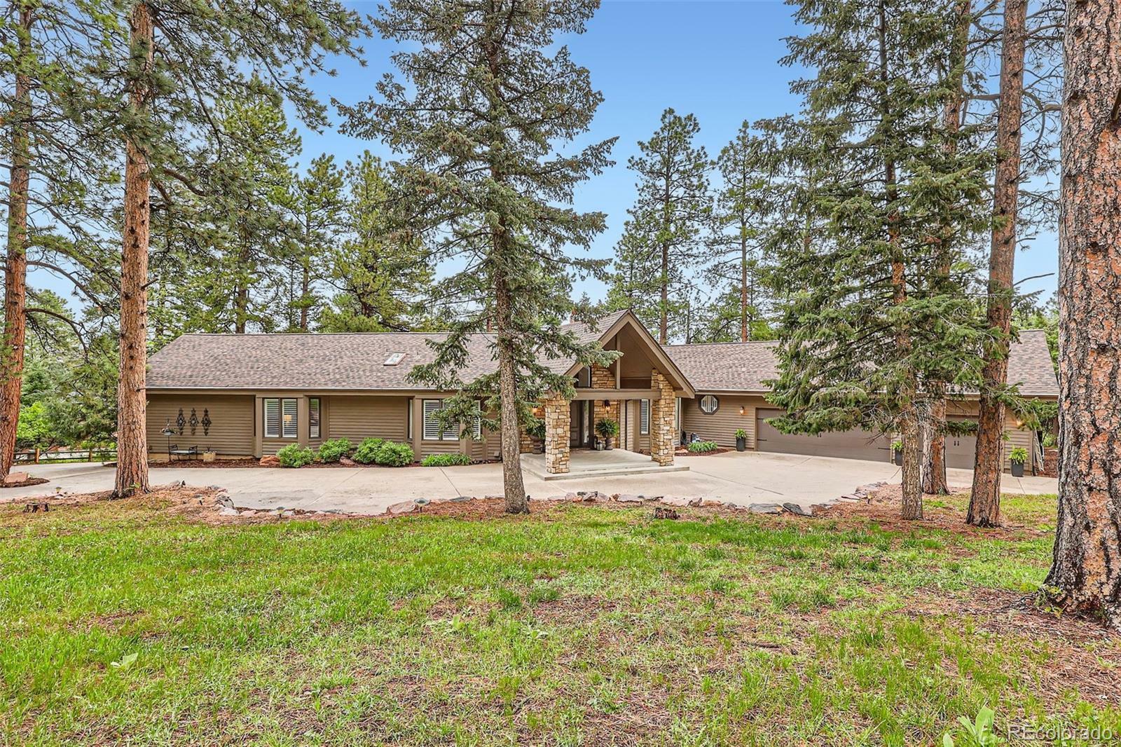Property Photo: 4856 Cheyenne Drive CO 80118