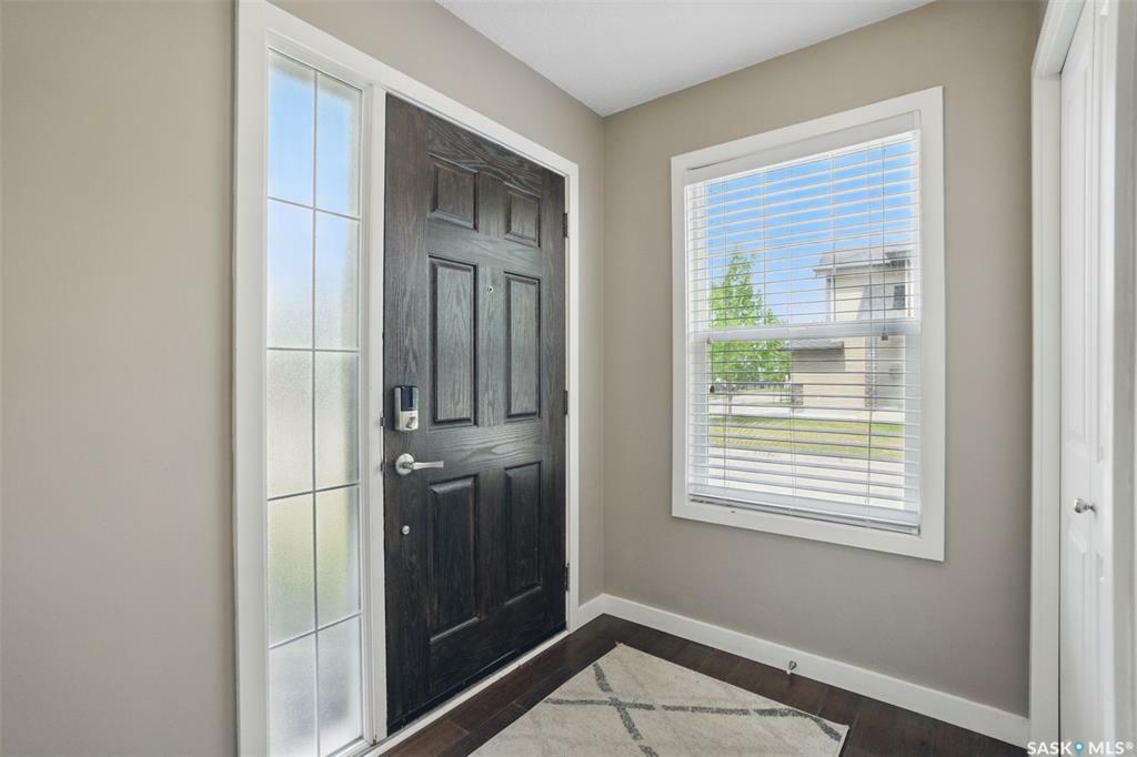 Property Photo: 410 Ledingham Way 104 SK S7V 0C4