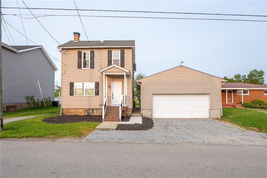 Property Photo:  1200 Wood St  PA 15650 