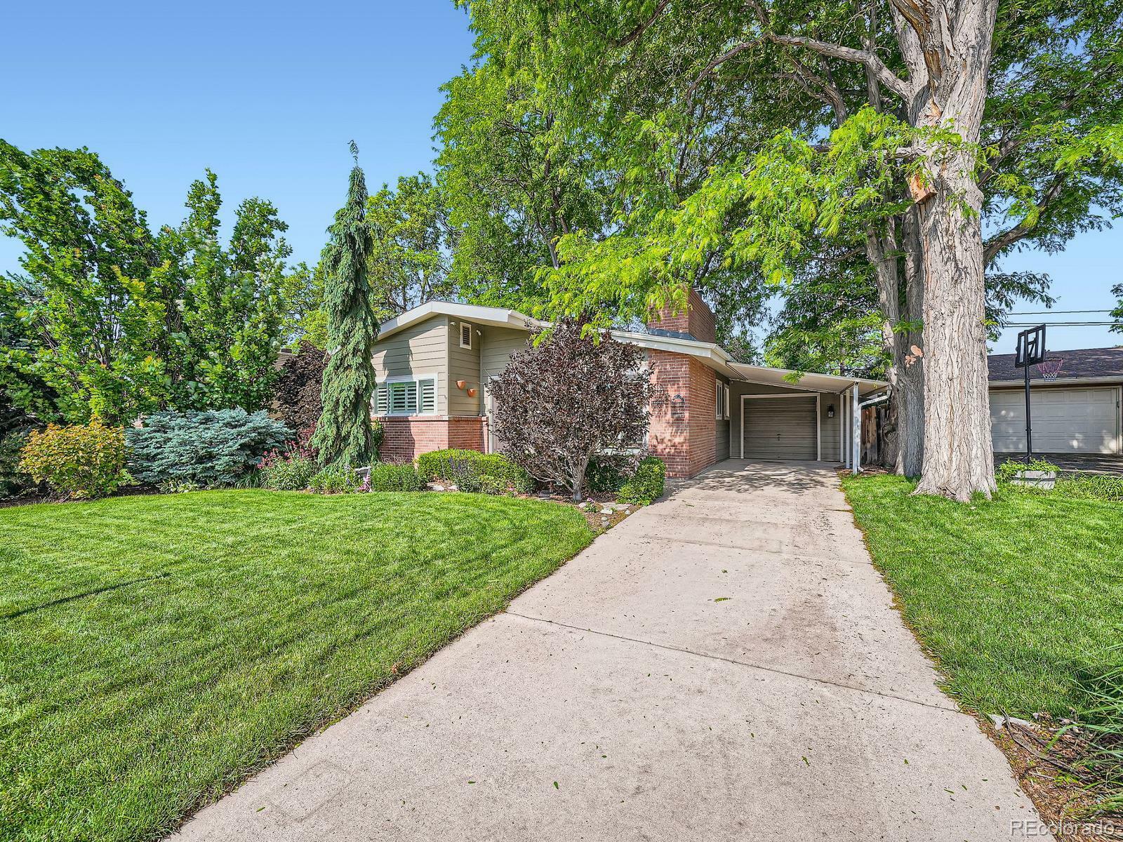 Property Photo: 2609 S Dahlia Street CO 80222