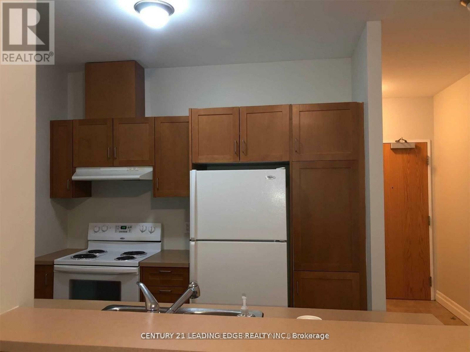 Property Photo: 44 Bond Street West 302 ON L1G 6R2