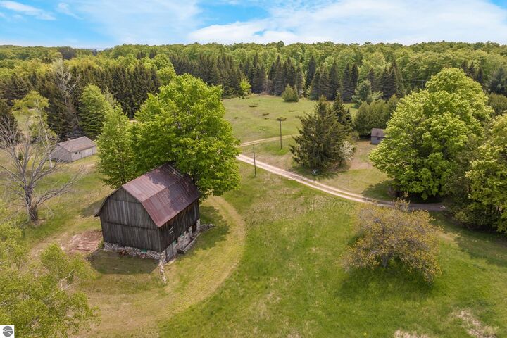 Property Photo:  12570 N Cathead Point Road  MI 49670 