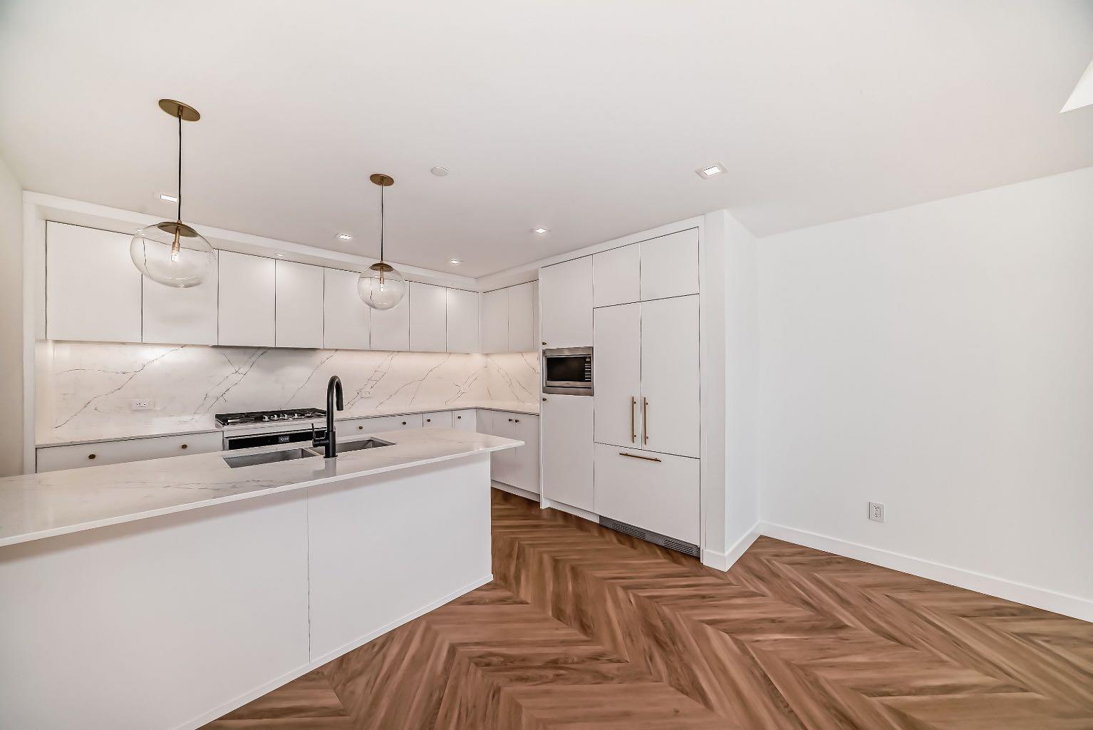 Property Photo: 8445 Broadcast Avenue SW 112 AB T3H 4C7
