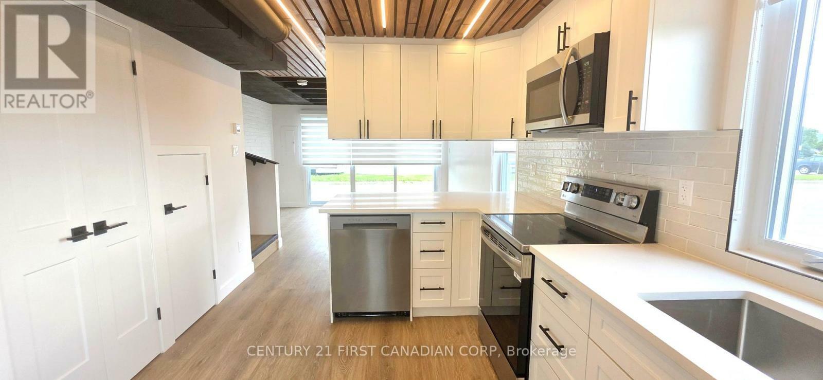 Property Photo: 857 Dundas Street 3 ON N5W 2Z8