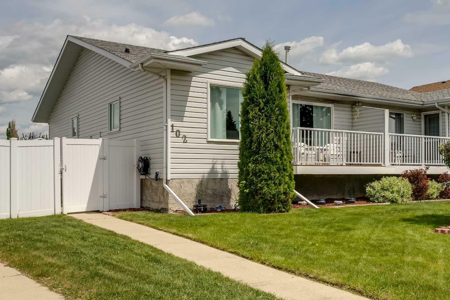 Property Photo: 102 Excell Street AB T2R 2H8