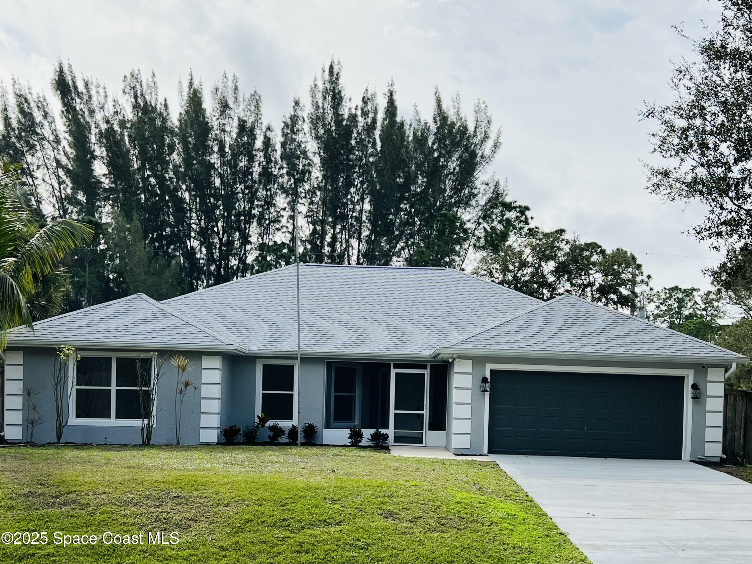 Property Photo: 476 Garbelmann Street SW FL 32908