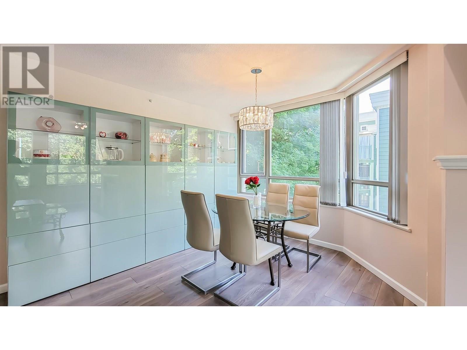 Property Photo: 3070 Guildford Way 203 BC V3B 7R8