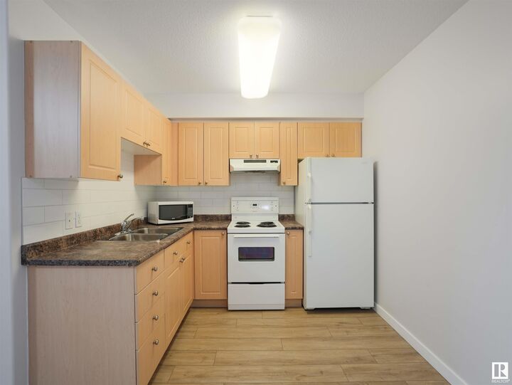 Property Photo:  8802 Southfort Drive 318  AB T8L 4R6 
