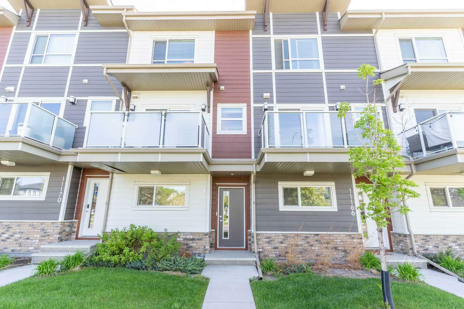 Property Photo: 11168 Harvest Hills Gate NE AB T3K 2M7