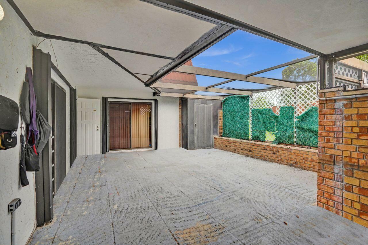 Property Photo: 4628 Suburban Pines Drive FL 33463