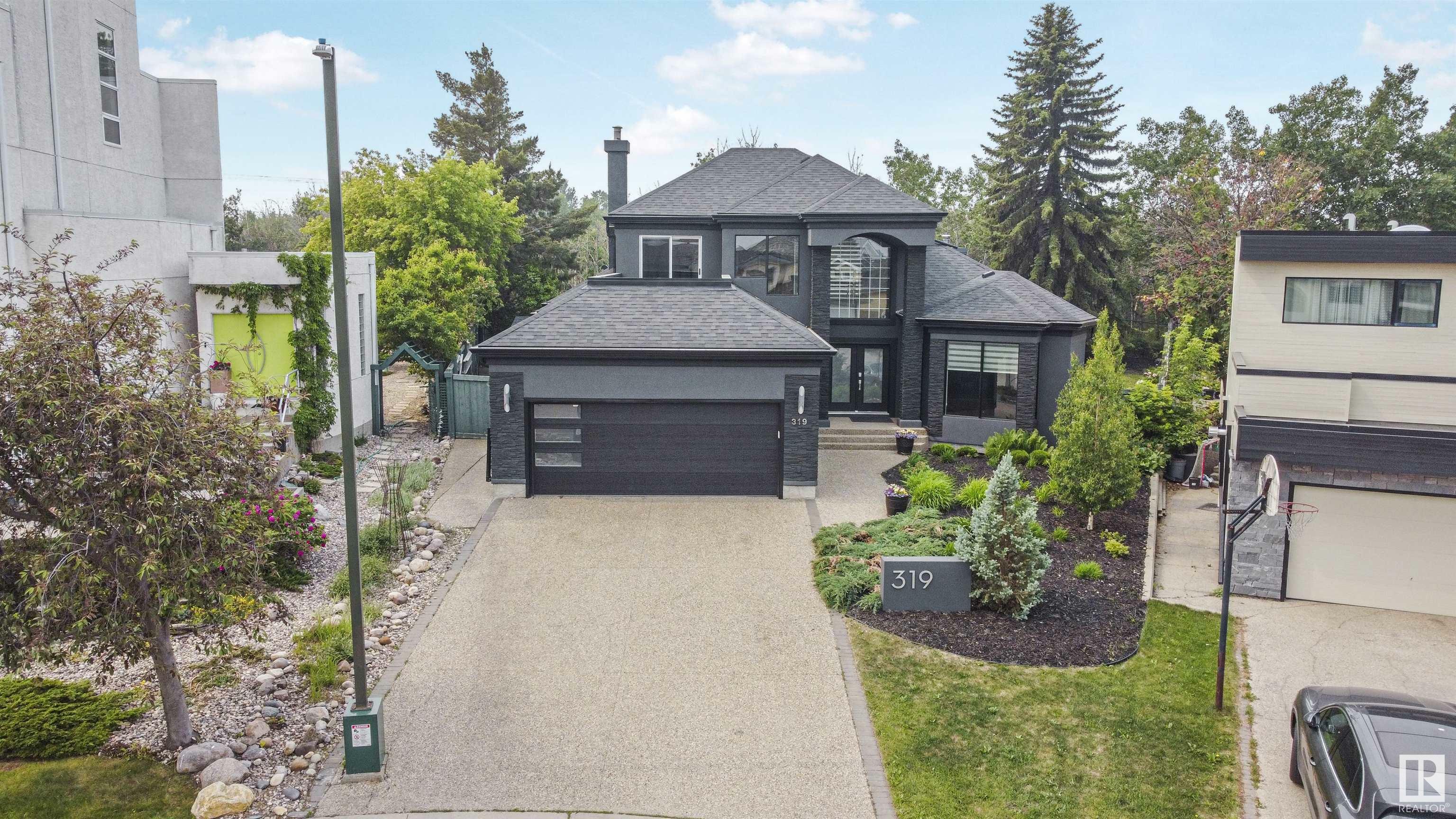 Property Photo: 319 Ferris Way NW AB T6R 2C4