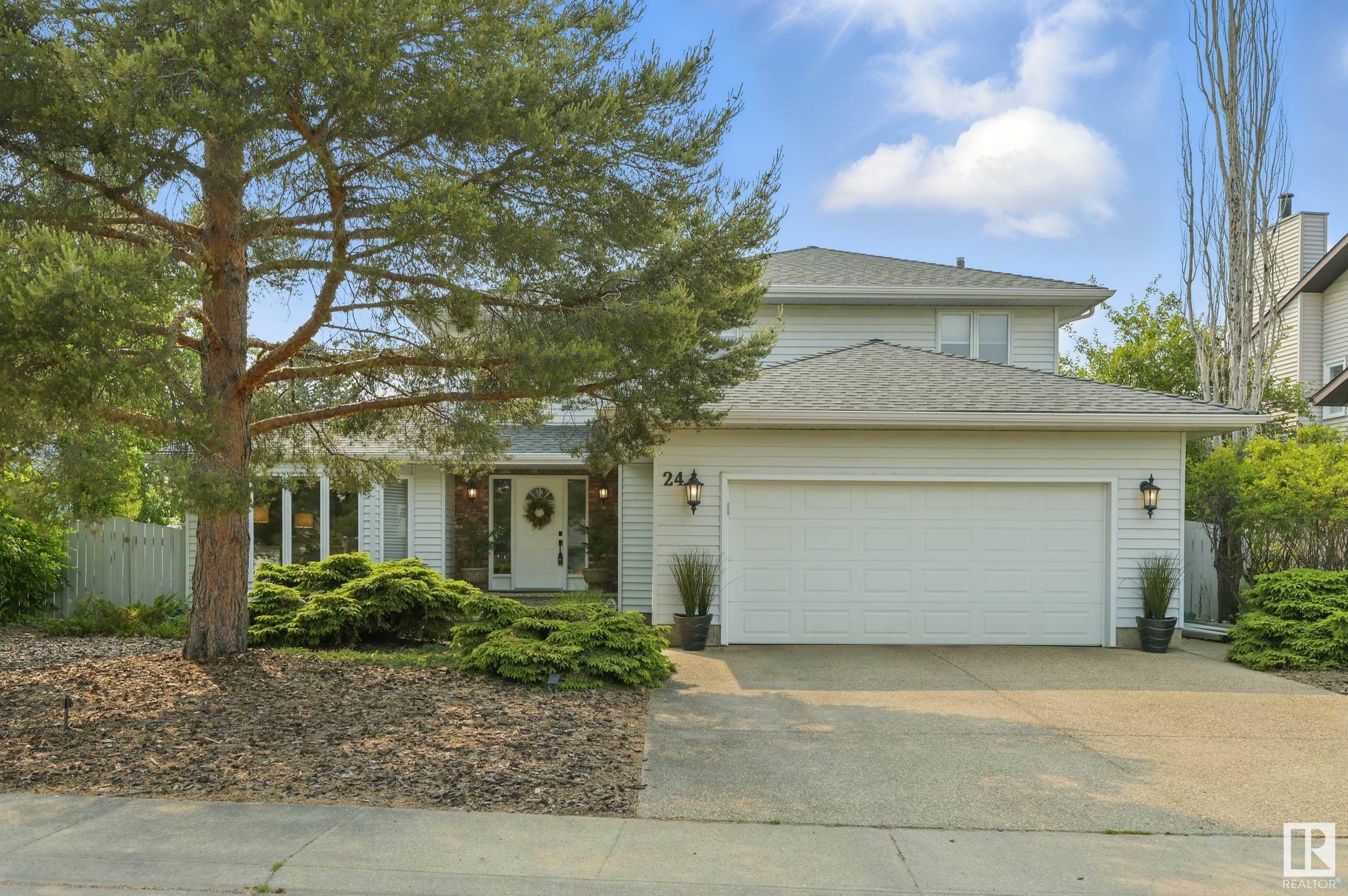 Property Photo: 24 Blue Quill Crescent NW AB T6J 6C2