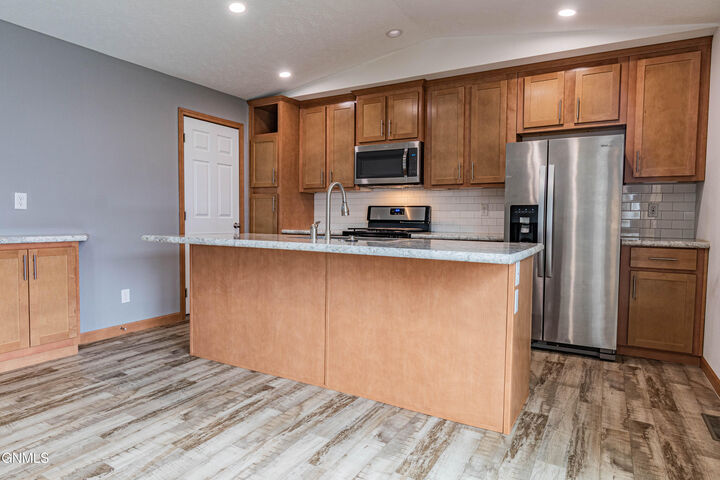 Property Photo: 1615 Fox Drive SE ND 58554