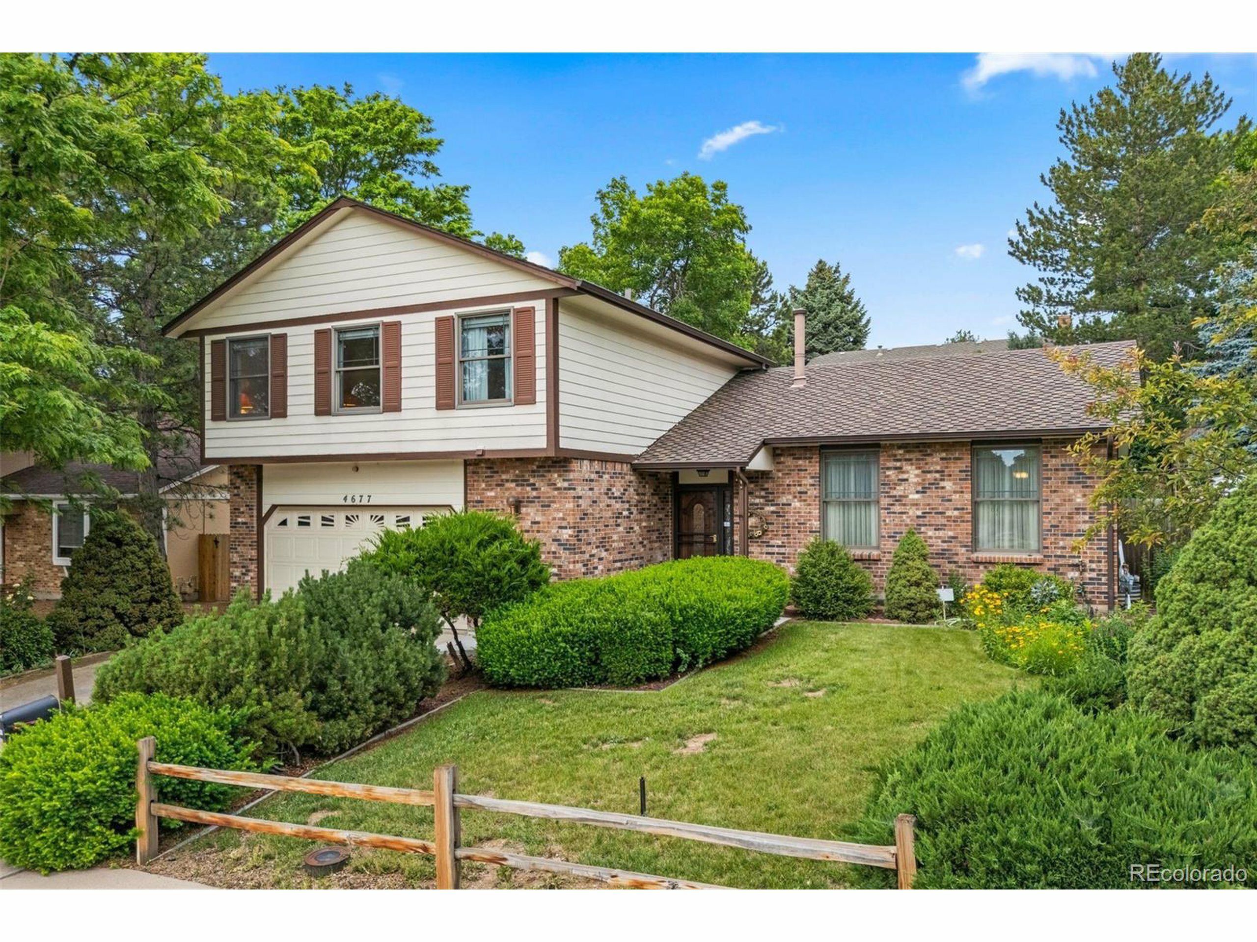 Property Photo: 4677 S Wolff St CO 80236