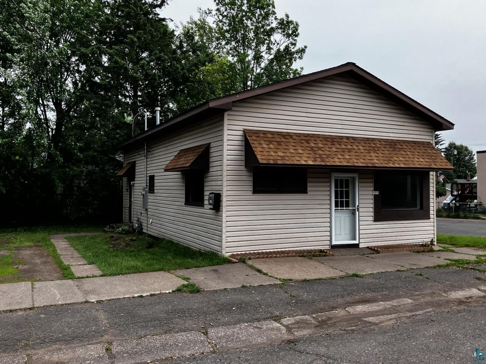 Property Photo:  1115 Ave F  MN 55720 