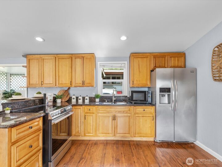 Property Photo:  7701  Hardeson Road 104  WA 98203 