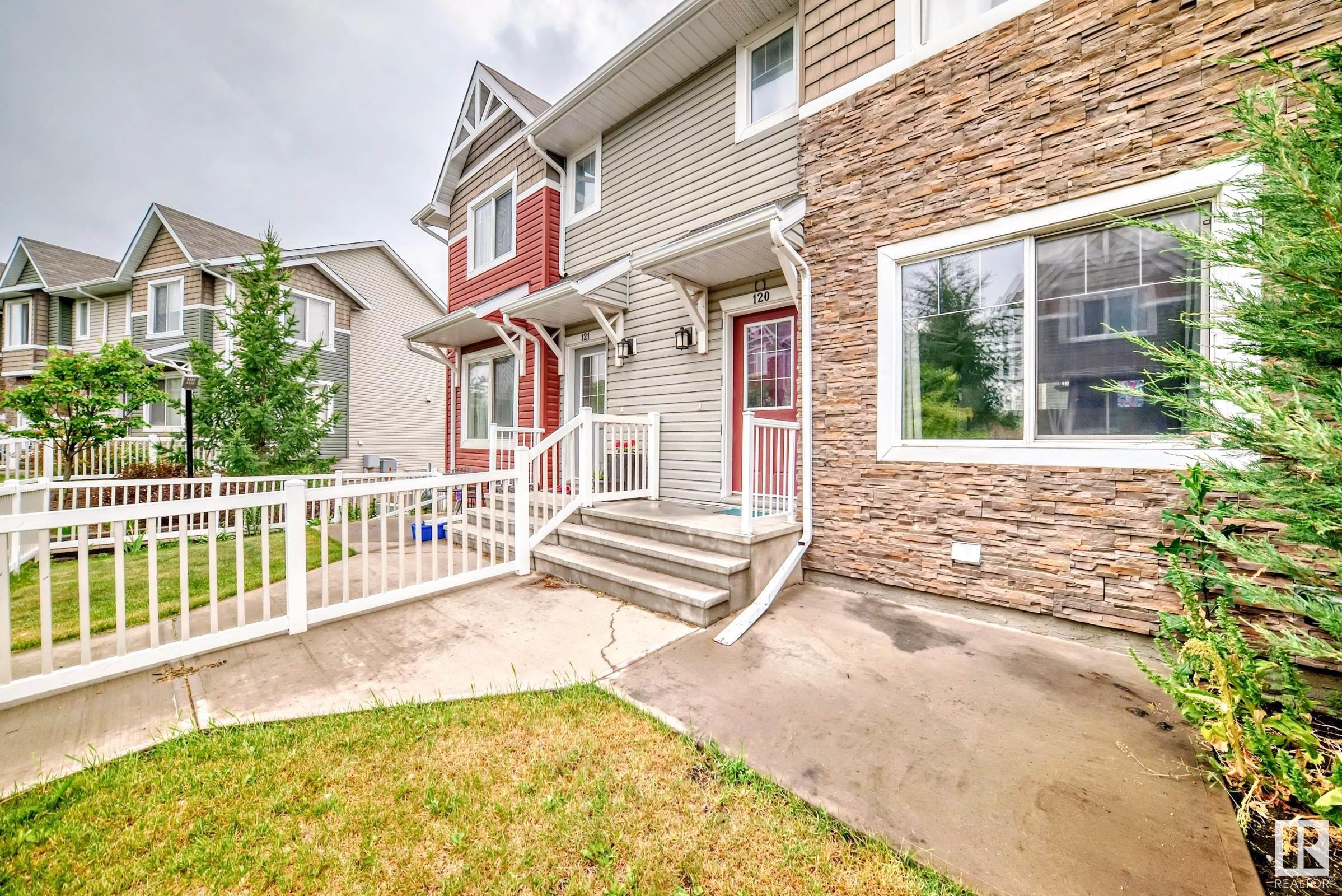 Property Photo: 655 Tamarack Road NW 120 AB T6T 0N4