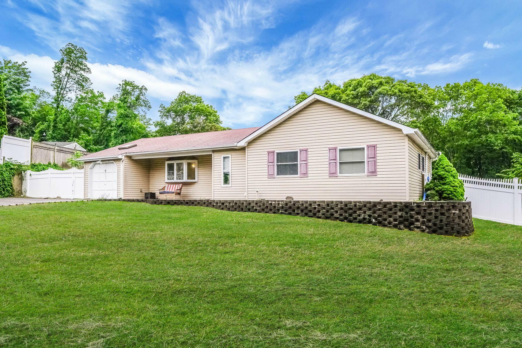Property Photo: 8 Peconic Lane NY 11784