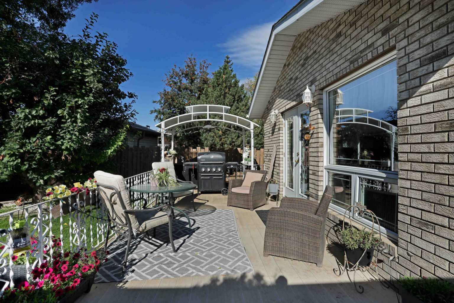 Property Photo: 11 Lakeview Crescent E AB T1R 0L9