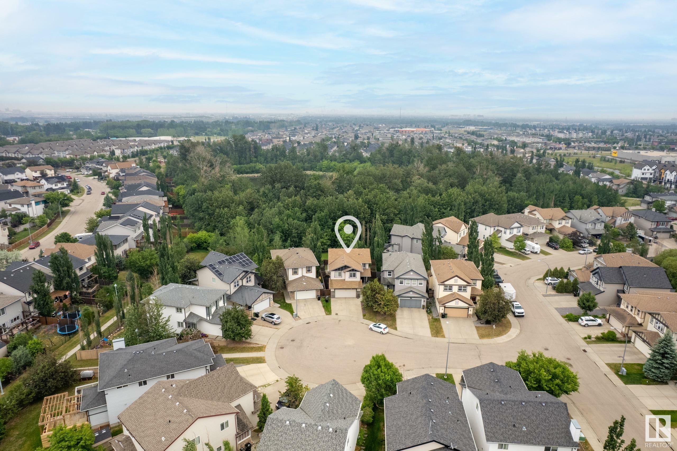 Property Photo: 9511 220 Street NW AB T5T 1N2