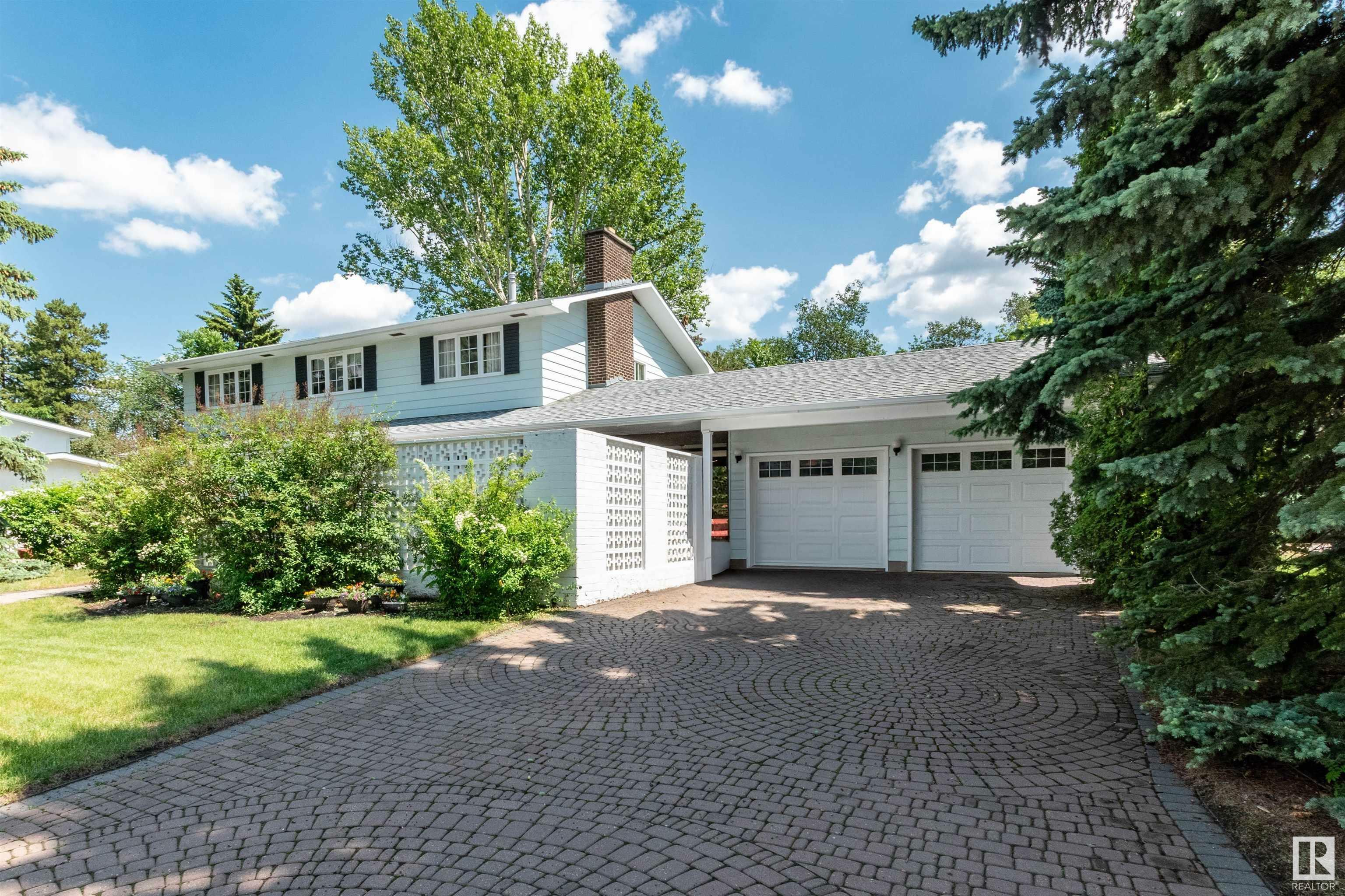 Property Photo: 12 Village Road AB T8A 0Z4