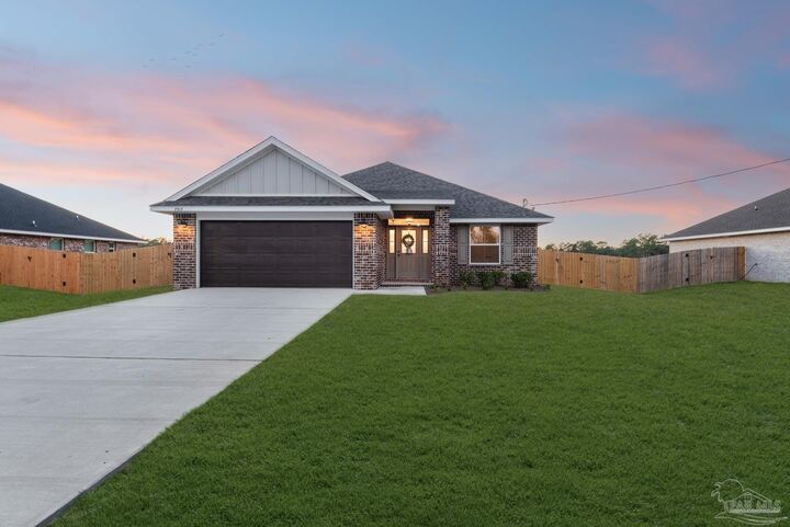 Property Photo: 7917 Twin Lake Dr FL 32583