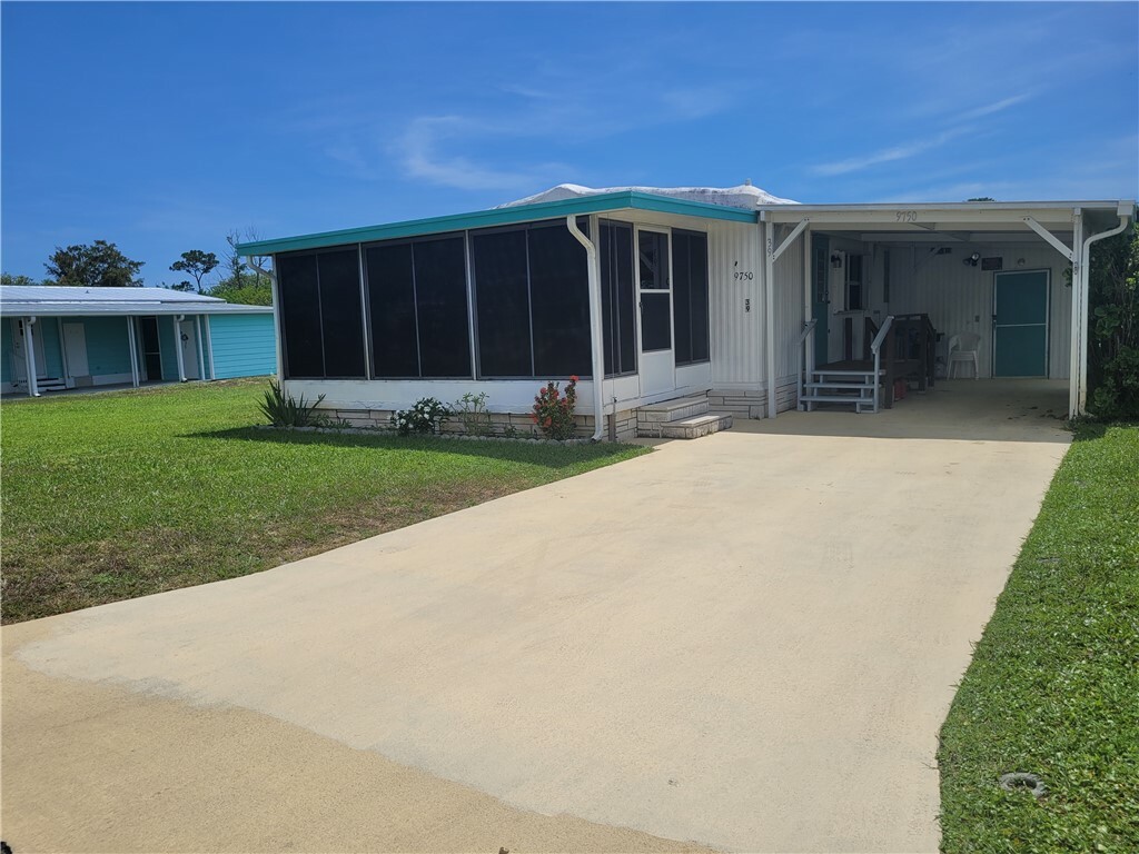 Property Photo: 9750 61st Terrace FL 32958