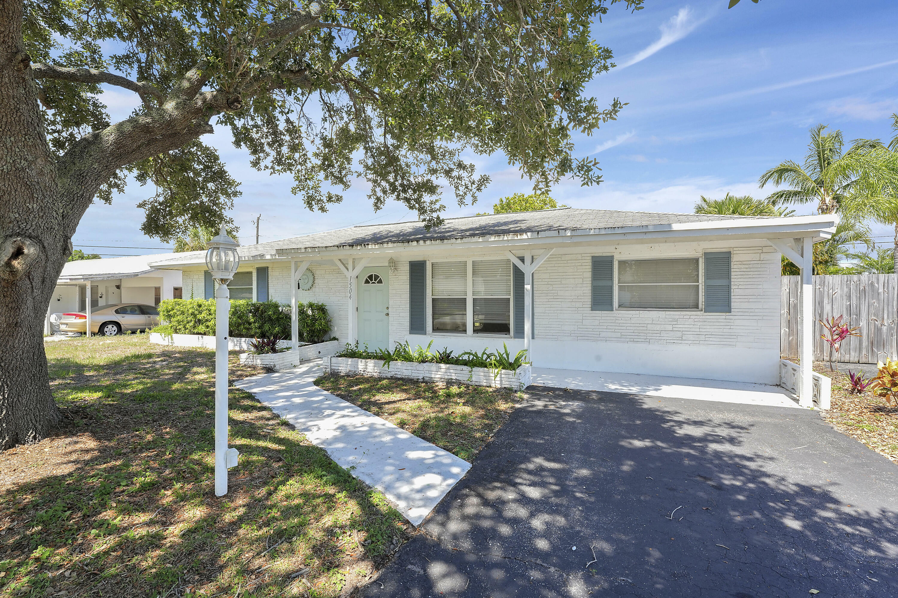 Property Photo: 1504 Treemont Avenue FL 33469