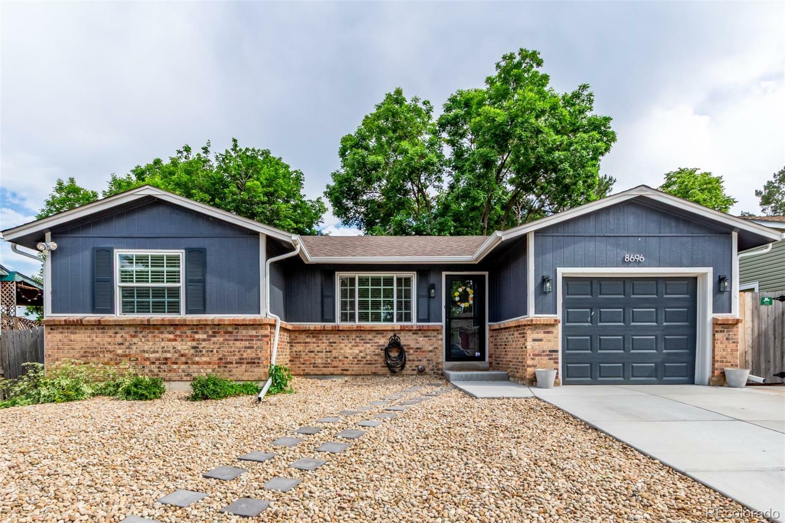 Property Photo: 8696 W 86th Circle CO 80005