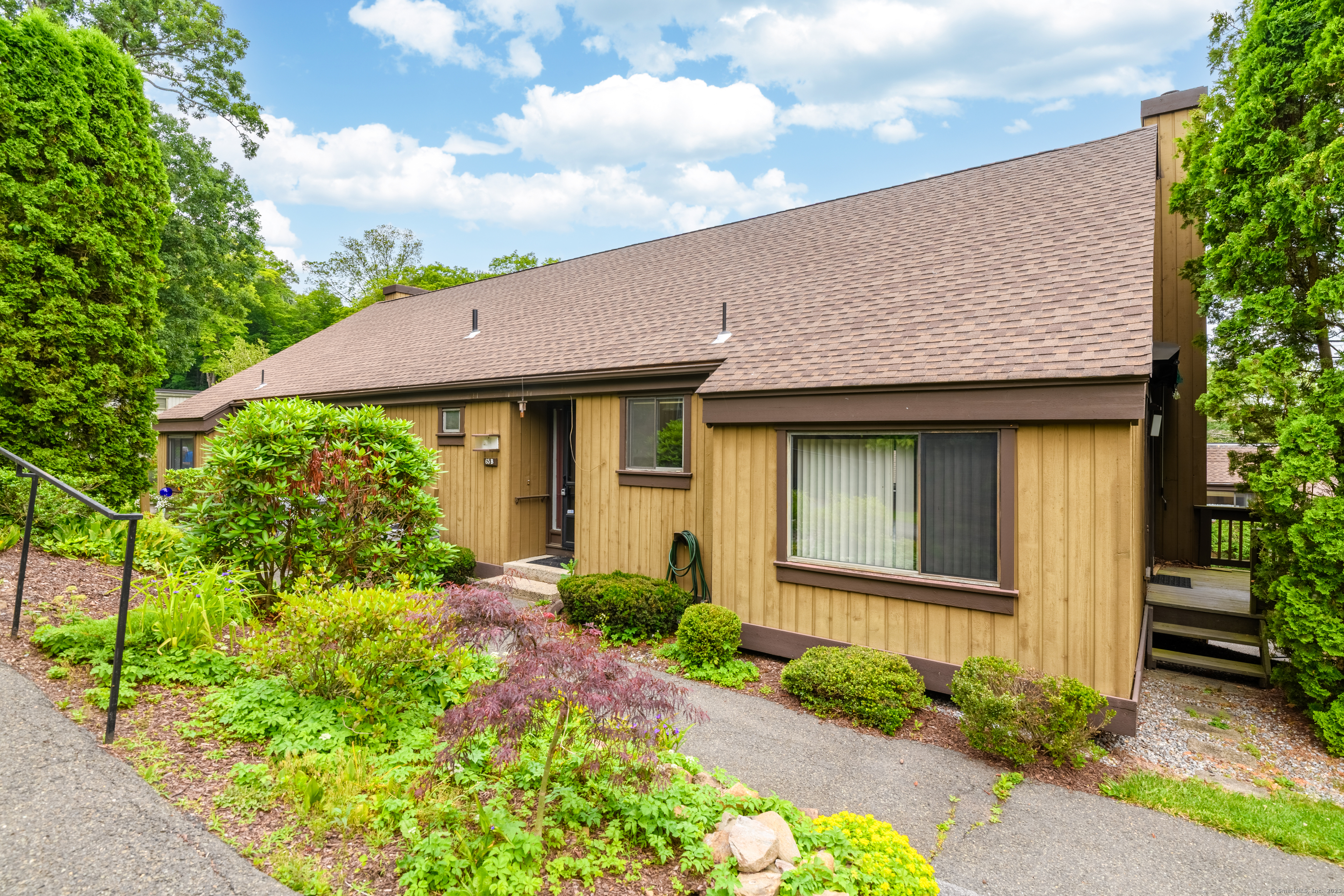 Property Photo: 65 Heritage Village B CT 06488
