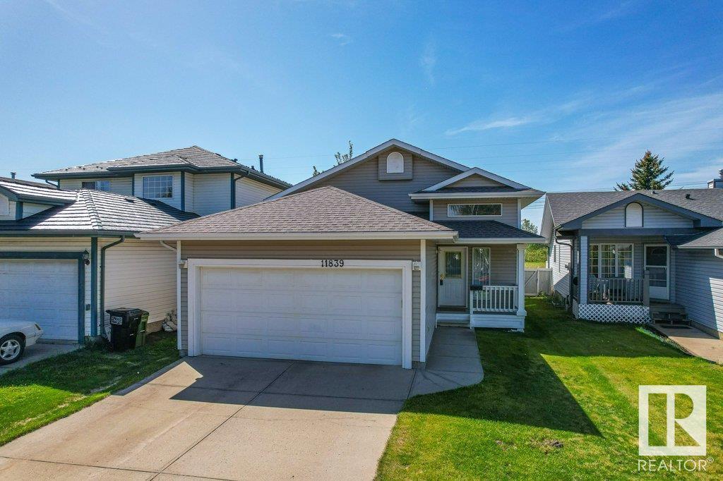 Property Photo: 11839 8 Avenue NW AB T6J 6Z9