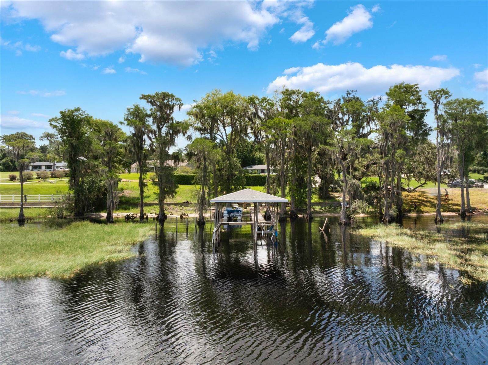 Property Photo: 12130 Lakeshore Drive FL 34711