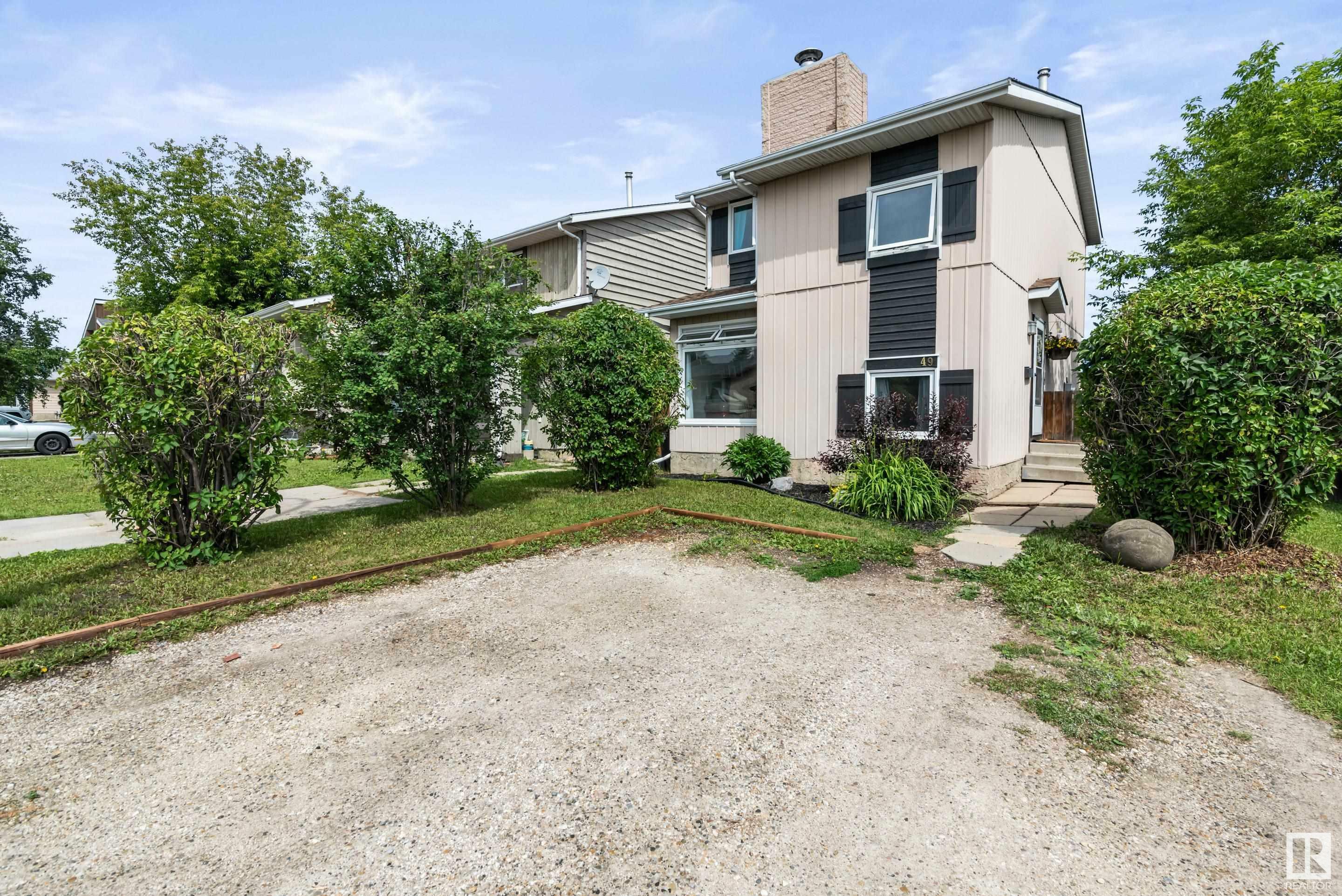Property Photo: #49 Wellington Crescent AB T7X 1K4