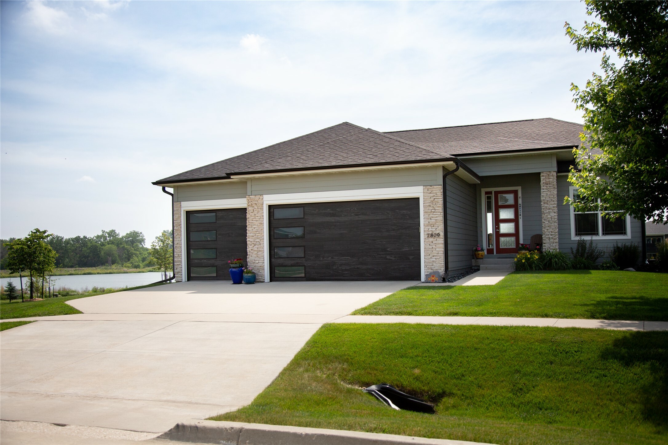 Property Photo:  7809 NW 96th Street  IA 50131 