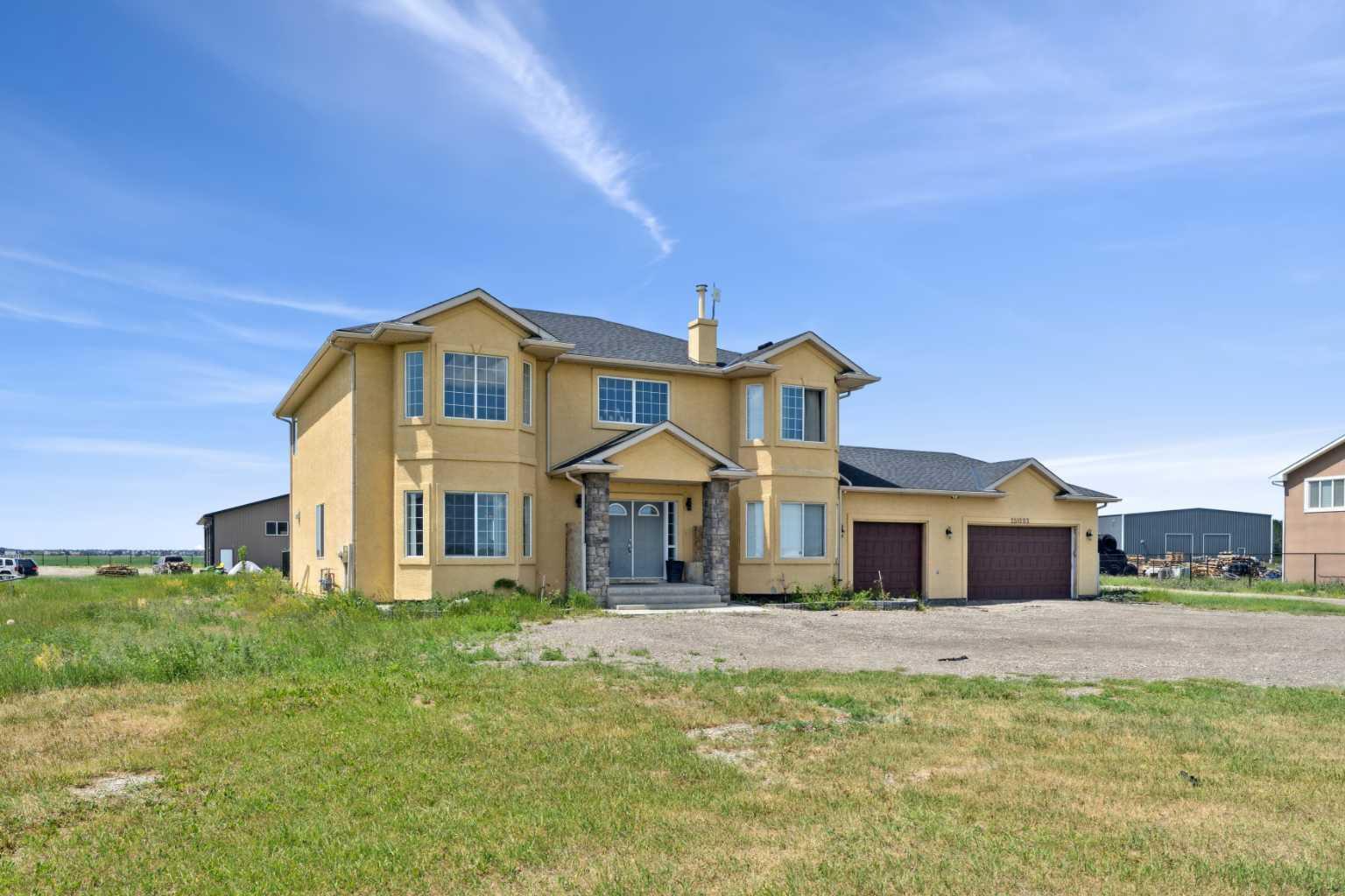 Property Photo: 251203 Sunshine Road AB T1Z 0M6