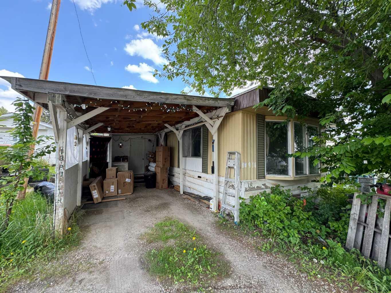 Property Photo: 6026 13 Avenue 18 AB T7E 1N5