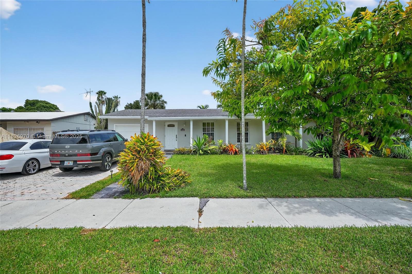 Property Photo: 10463 SW 124th Pl FL 33186