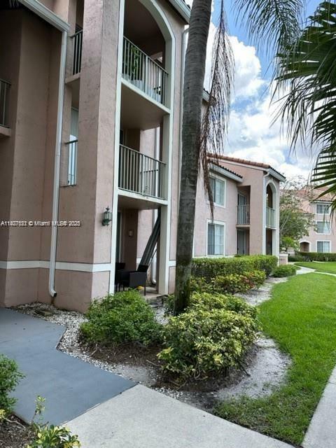 Property Photo: 12148 Saint Andrews Pl 104 FL 33025
