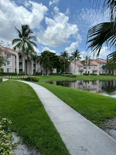 Property Photo:  12148 Saint Andrews Pl 104  FL 33025 