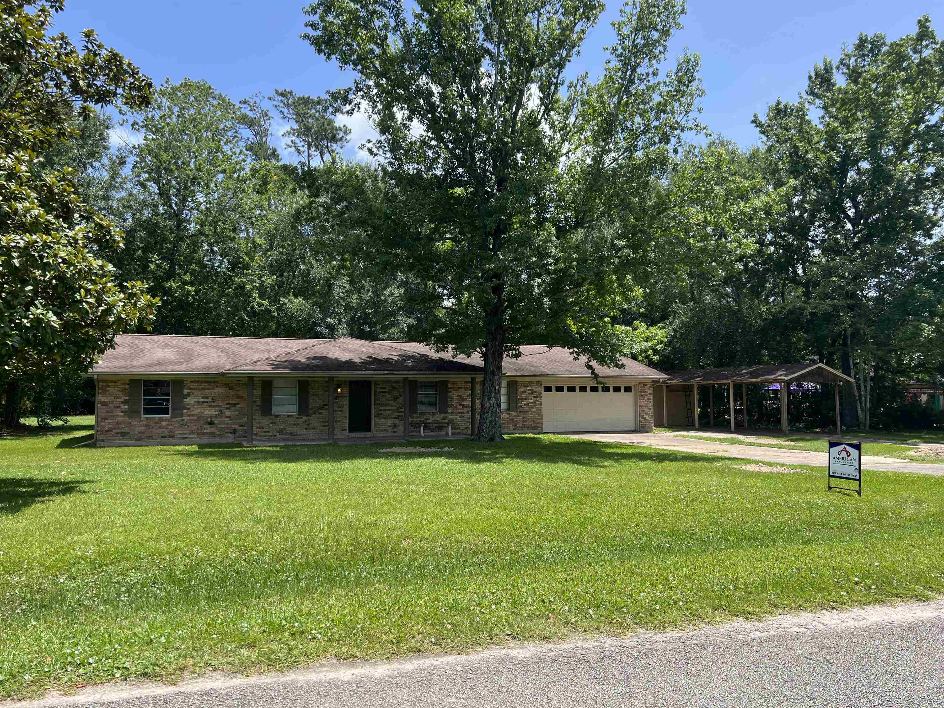 Property Photo:  100 Cypress Bend  TX 77663 