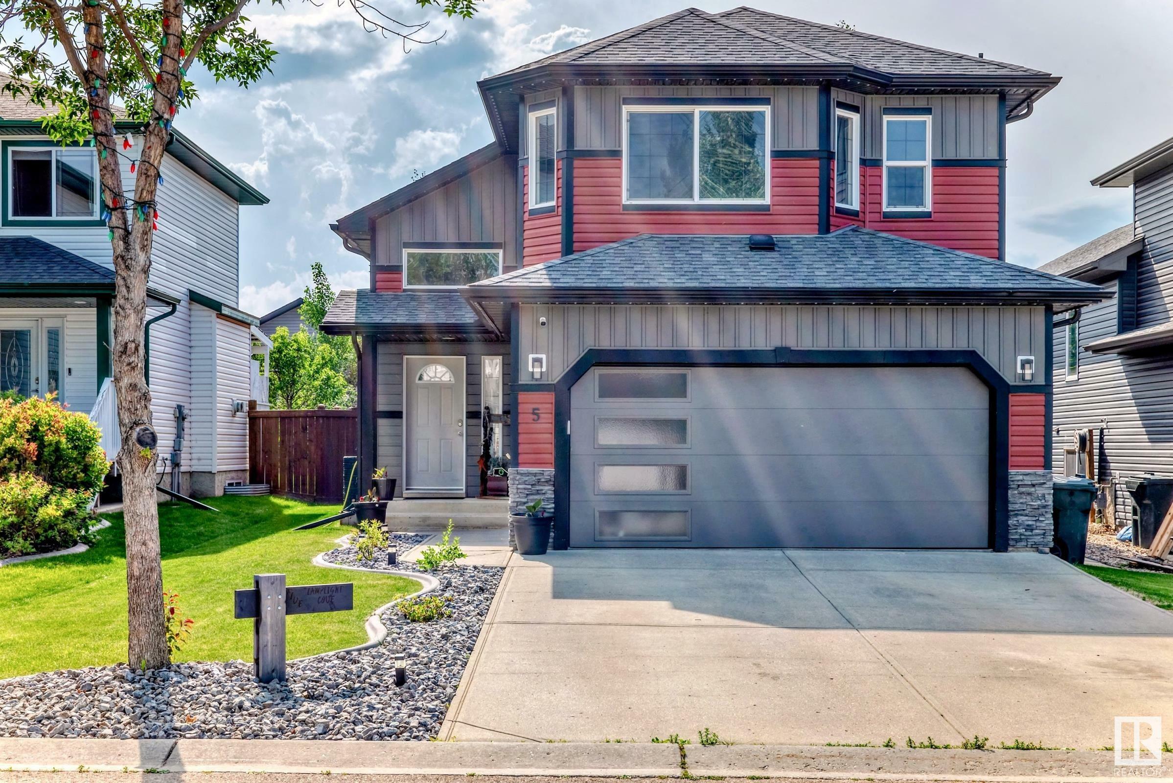 Property Photo: 5 Lamplight Cove AB T7X 4R2
